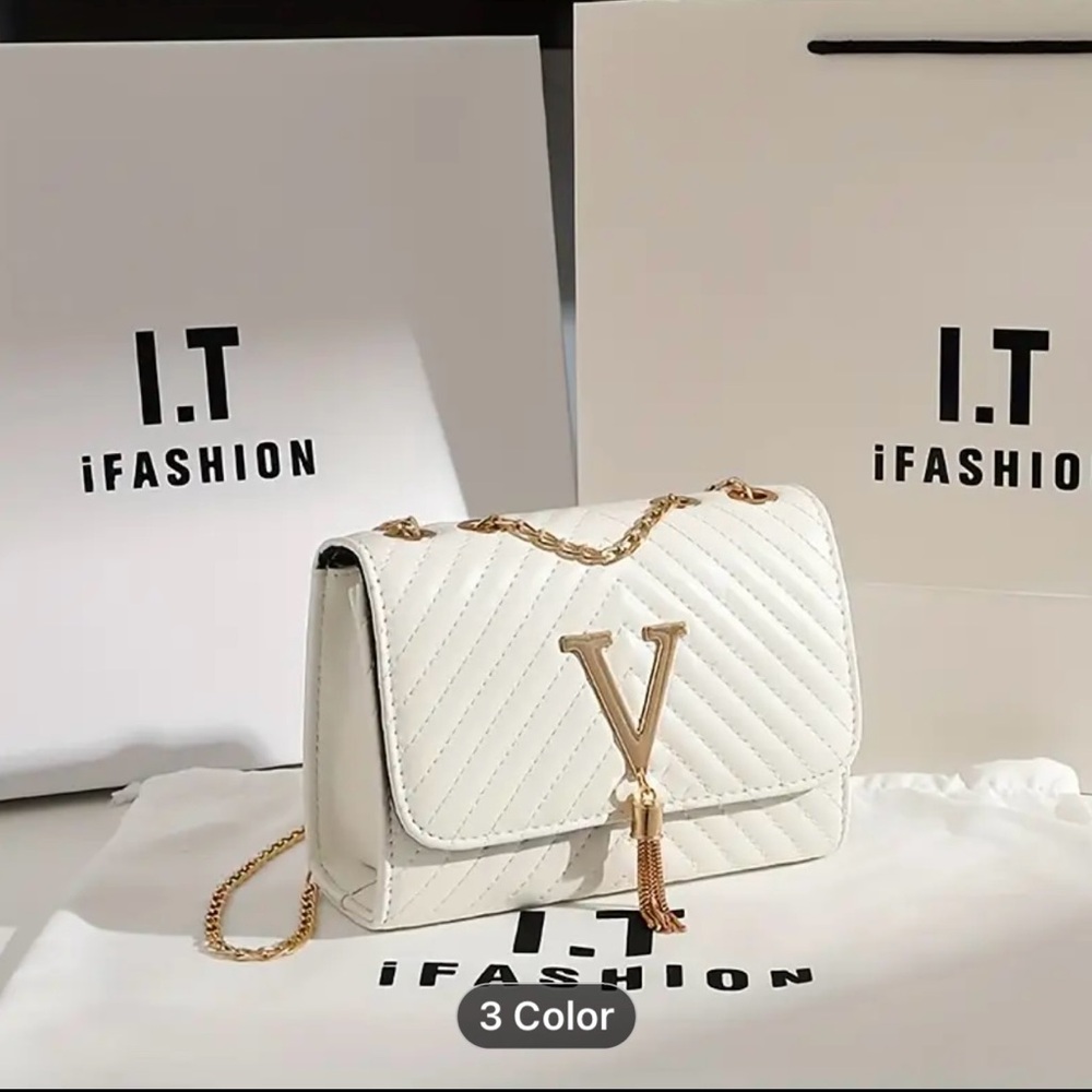 Elegant White Quilted Bag with Gold Accents